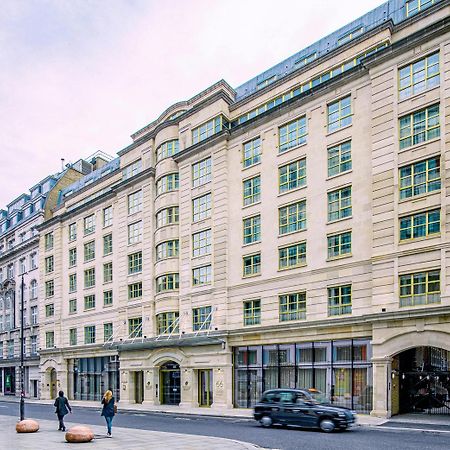 Middle Eight - Covent Garden - Preferred Hotels And Resorts Λονδίνο Εξωτερικό φωτογραφία The photo shows a large, multi-story building with a classical architectural style. The facade features a mix of light-colored stone and large windows, giving it a sophisticated appearance. The building has several levels with prominent horizontal li